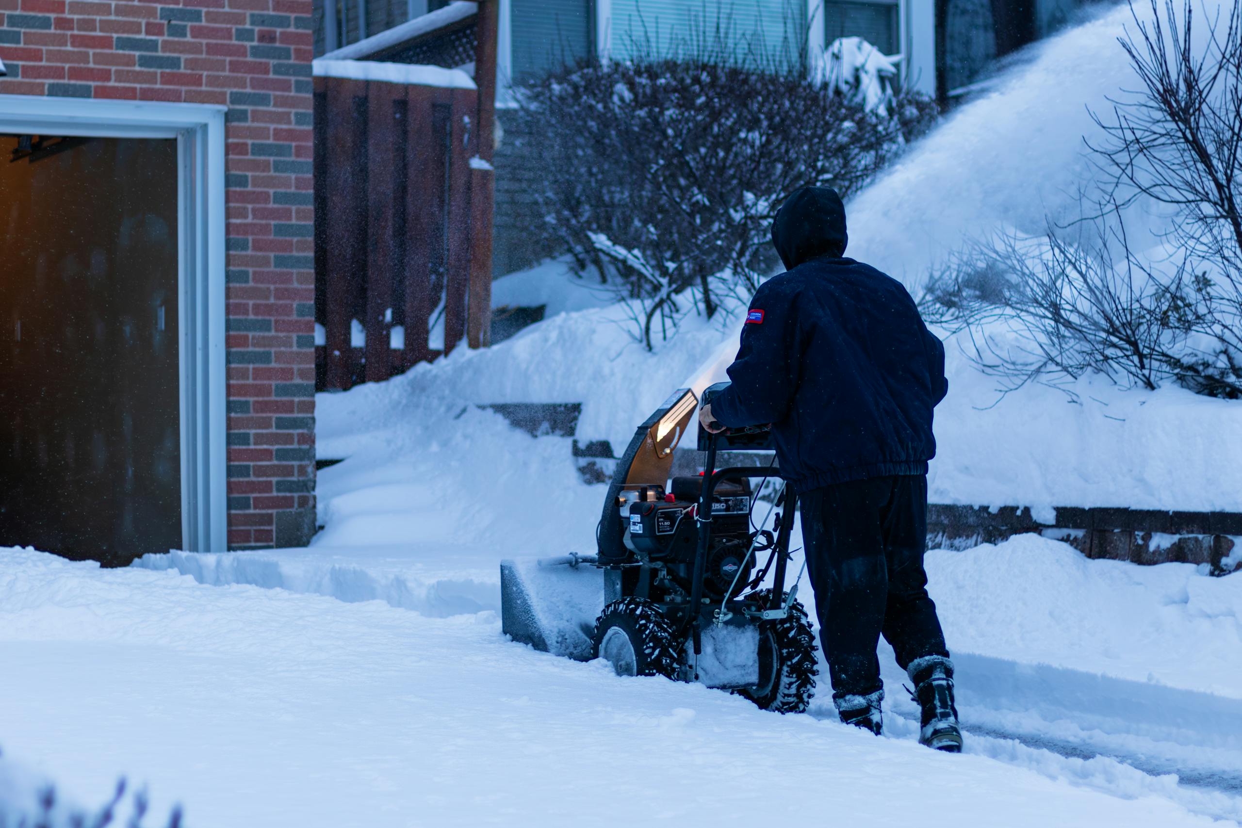 Snow removal from the front yard of a house